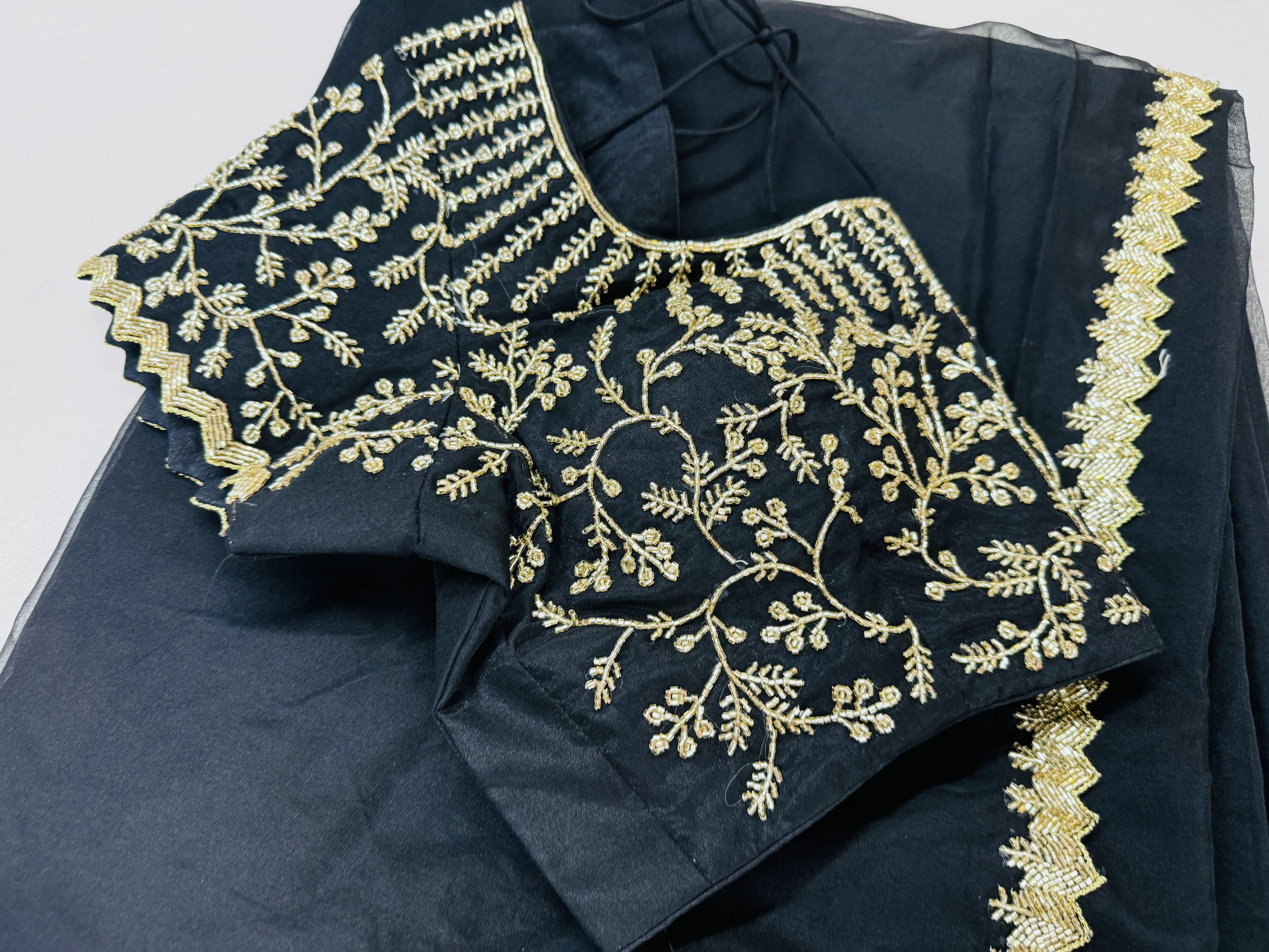 Midnight black embroidered Organza saree with stitched blouse