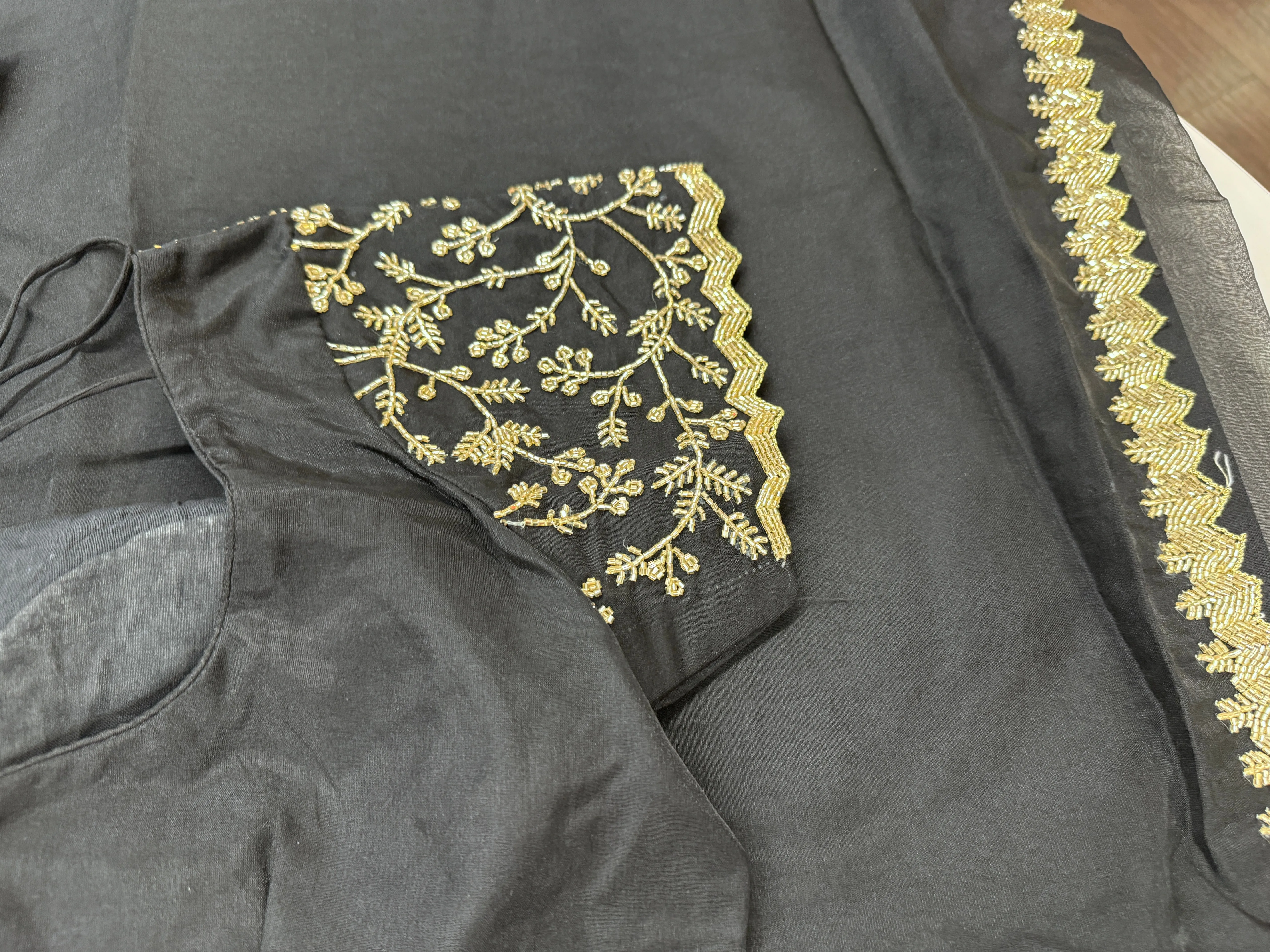 Midnight black embroidered Organza saree with stitched blouse