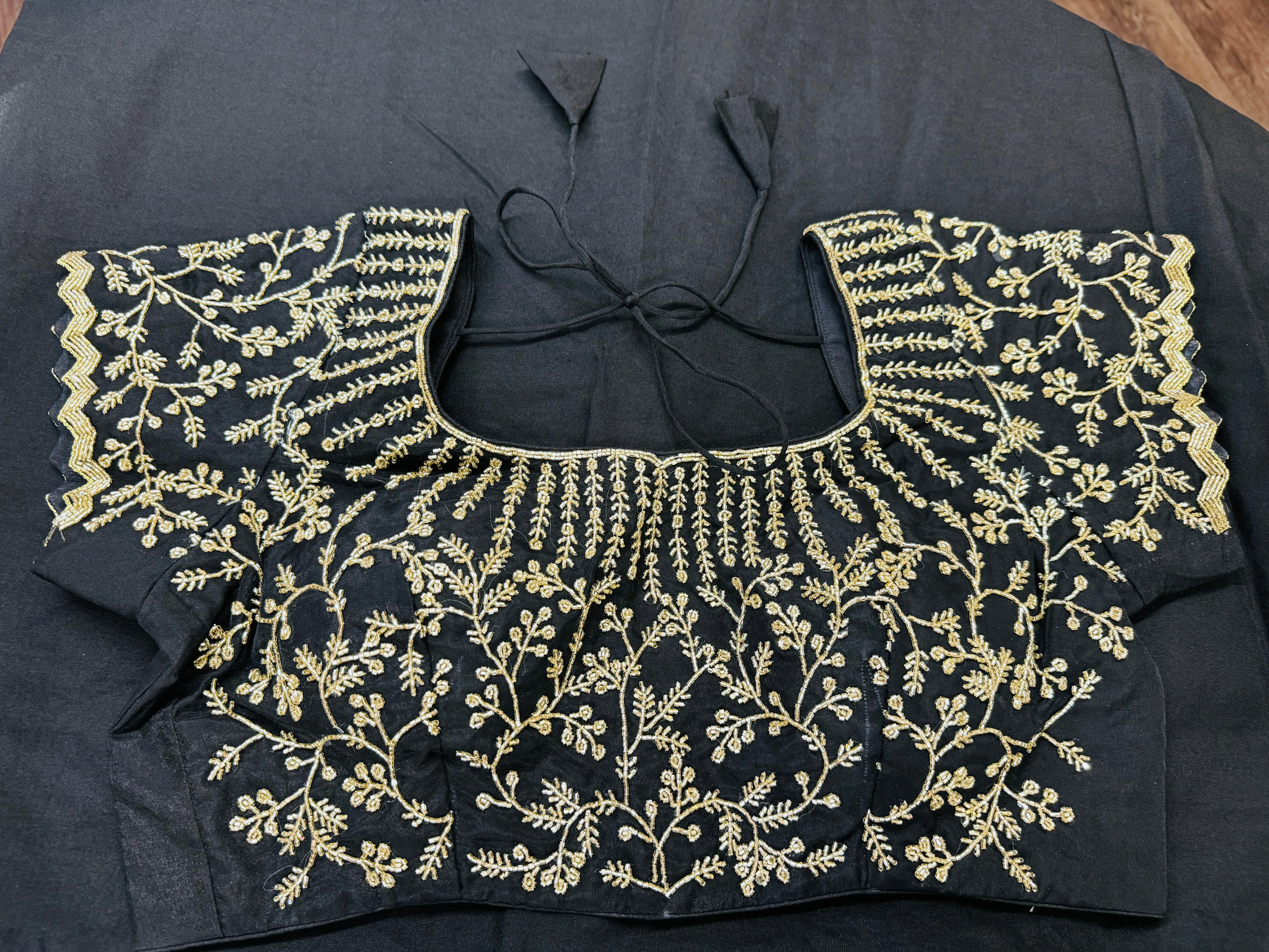 Midnight black embroidered Organza saree with stitched blouse