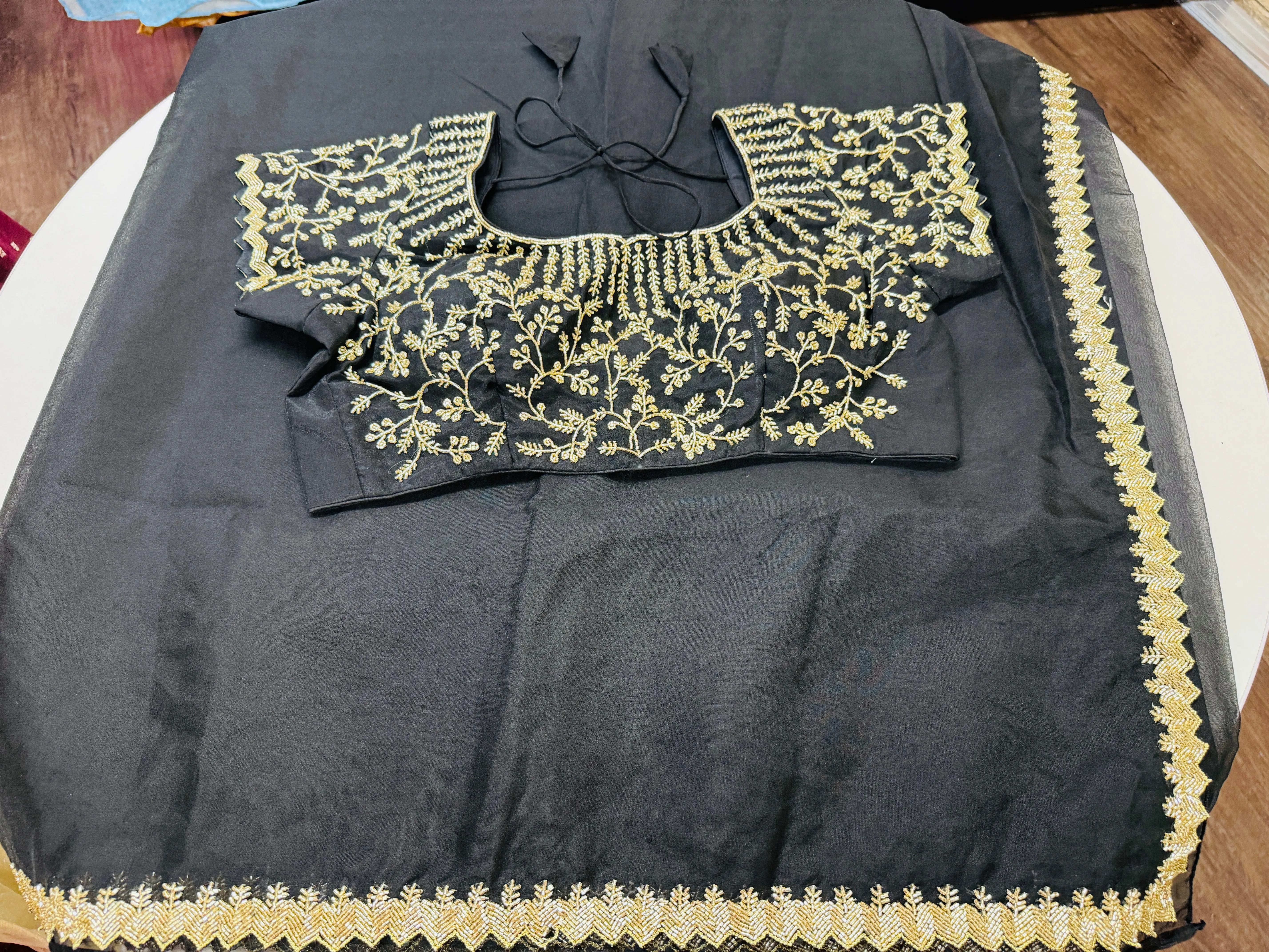 Midnight black embroidered Organza saree with stitched blouse