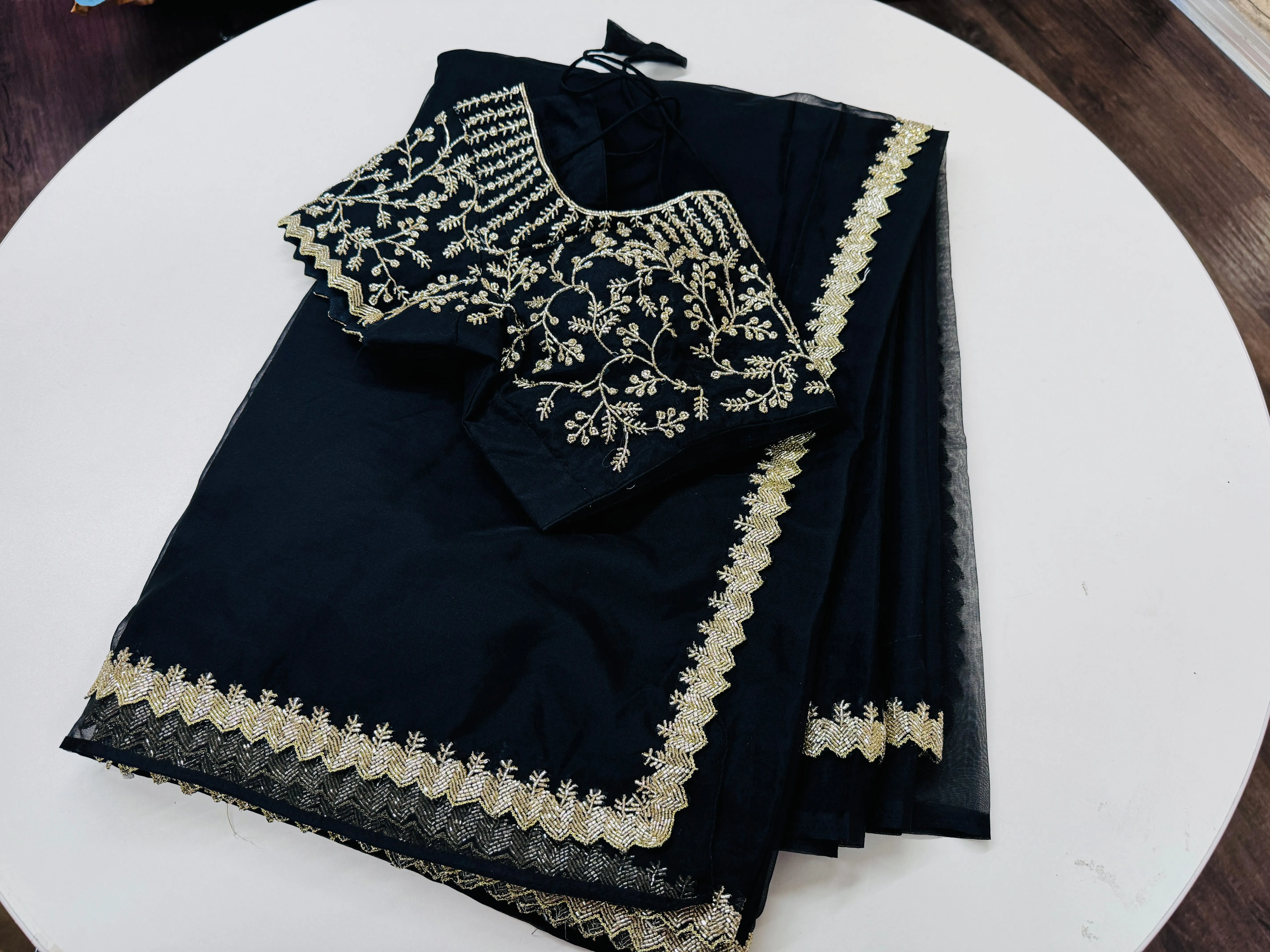 Midnight black embroidered Organza saree with stitched blouse